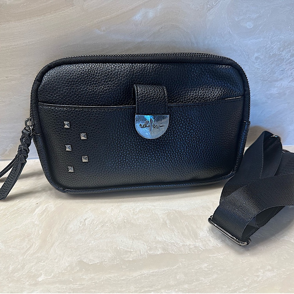 RadRev sling wallet w/stripe interior and nylon strap.